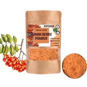 May include: A brown paper pouch with a label that reads "Freeze Dried Rowan Berry Powder" and "Perfect for: Smoothies, Cooking, Baking". The pouch contains a bright orange powder. A small illustration of rowan berries is on the label.