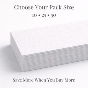 May include: A pile of white rectangular cards with a textured finish. The text "Choose Your Pack Size" is above the numbers 10, 25, and 50. The phrase "Save More When You Buy More" is below the stack of cards.