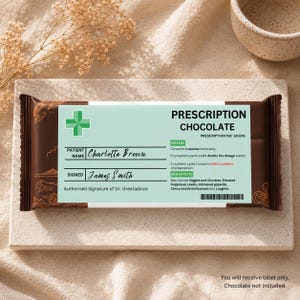 May include: A rectangular chocolate bar wrapper with a light green label featuring a green cross icon. The text reads Prescription Chocolate, Patient Name Charlotte Brown, Signed James Smith, and includes dosage instructions and side effects.