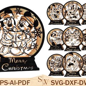 May include: Laser-cut wooden Christmas decorations featuring Mickey and Minnie Mouse in festive scenes. Each decoration is circular with a black base and the words "Merry Christmas" cut out. The decorations are designed with snowflakes.