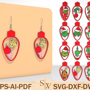 May include: Red Christmas light bulb earrings featuring a cartoon character in a pink dress. The earrings are displayed on a peach-colored background. Additional earrings with Grinch-themed designs are also shown.