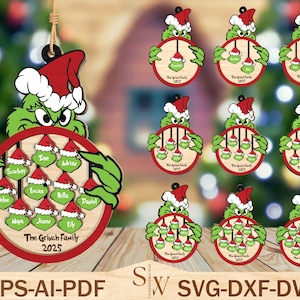 May include: Wooden Christmas ornament featuring the Grinch wearing a Santa hat, holding a circular frame with family names. The frame is red and has a wooden interior. The text "The Grinch Family 2025" is at the bottom. The ornament is green, red, and white.