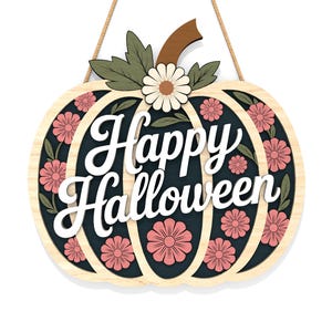 May include: A wooden pumpkin-shaped sign with the words "Happy Halloween" in white script. The sign features pink flowers and green leaves on a dark background, with a light wood border. A brown stem and a daisy are at the top, with a jute rope for hanging.