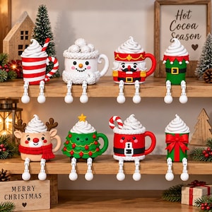 May include: A set of eight decorative shelf-sitting mugs featuring festive holiday designs including a nutcracker, snowman, reindeer, and Christmas tree, each topped with white whipped cream and dangling white ball-tipped legs.