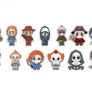 May include: A collection of cartoon-style horror movie character ornaments. The ornaments feature characters like Annabelle, Chucky, Freddy Krueger, and Michael Myers. Each ornament is brightly colored and has a small loop at the top for hanging.