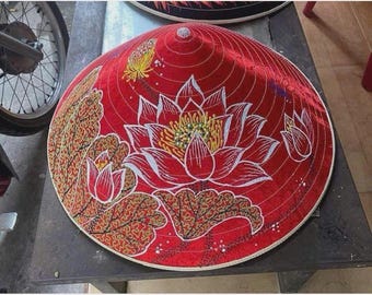 Silk-covered conical hat painted with lotus flowers