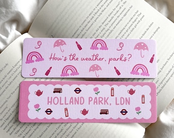 May include: Two pink bookmarks with text and illustrations. One says "How's the weather, parks?" with rainbows, umbrellas, and lipstick. The other says "HOLLAND PARK, LDN" with London icons and flowers.