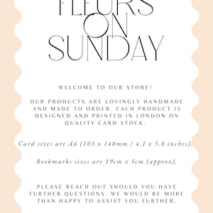 May include: A cream-colored card with the text "FLEURS ON SUNDAY" in a stylish font. The card includes information about handmade products, card sizes (4.1 x 5.8 inches), and bookmark sizes (19cm x 5cm).