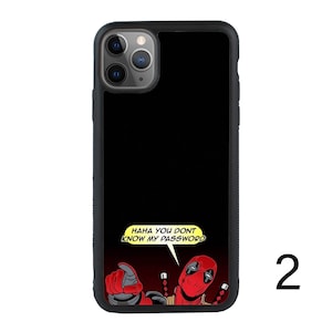 May include: Black phone case with a red and black Deadpool character graphic. The graphic says "HAHA YOU DON'T KNOW MY PASSWORD".