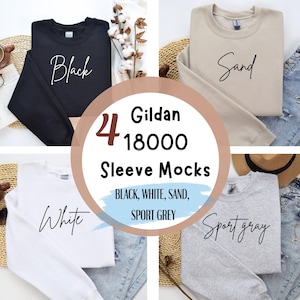 May include: Four Gildan 18000 long-sleeve shirts in black, white, sand, and sport gray. Each shirt has a different color and a simple text design.