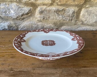 Soporte para pasteles francés antiguo Terre de Fer: patrón 'Esclavo' de Jules Vieillard