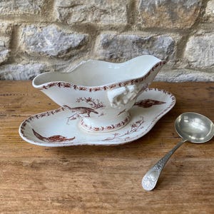 Porcelaine Opaque de Gien model &#39;Perdrix&#39; sauceboat Terre de Fer