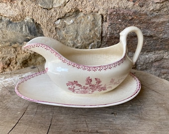 Porcelaine from Longwy model &#39;Mesange&#39; sauceboat in pink Terre de Fer