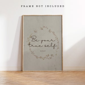 May include: A beige printable wall art print with a brown floral wreath and the text "Be your true self" with the word "Author" below the text.