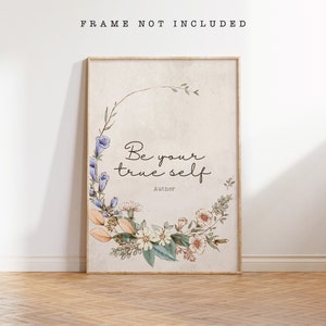 May include: A beige printable art print with a floral wreath design. The text "Be your true self" is in the center of the wreath. The word "Author" is below the text.