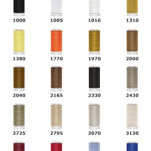 May include: A collection of Gütermann Denim Sewing Thread 100m spools in twenty distinct colours. Each spool is labelled with a specific colour code number, including 1000, 1005, 1016, 1310, 1380, 1770, 1970, 2000, 2040, 2165, 2330, 2430, 2725, 2795, 3070, 3130, 4466, 4495, 6140, and 6690.