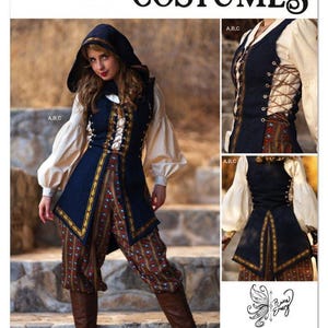 May include: Simplicity Costumes pattern S3189. The image shows a medieval-style costume with a navy blue vest, cream-colored blouse, and patterned pants. The vest has gold trim and a lace-up front. The costume includes a hooded cloak and brown boots.