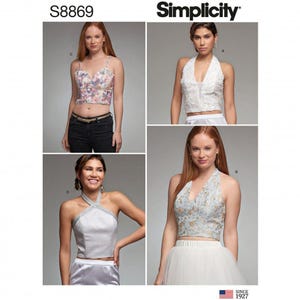 May include: Simplicity pattern S8869 features four crop top designs. View C is a floral print bustier. View A is a white textured halter top. View D is a silver satin halter top with a cross-neck detail. View B is a light blue floral print halter top.