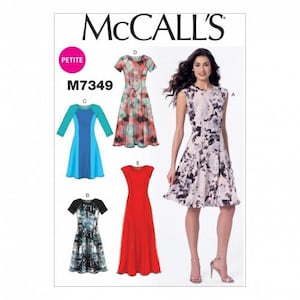 May include: McCall's sewing pattern M7349 for a petite dress with five different style variations. The pattern includes a sleeveless dress with a floral print, a dress with a teal and blue color block design, a dress with a black and white abstract print, a red dress with a scoop neck, and a dress with a pink and green tie-dye print.