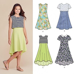 May include: Simplicity pattern 8065 for girls' plus sizes 8 1/2-16 1/2. The sewing pattern features four dress variations with different sleeve lengths, necklines, and skirt styles, including floral prints, solid lime green, and striped bodices.