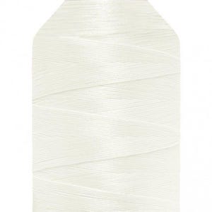 May include: A large spool of white sewing thread with a label at the top that reads Gütermann Bulky-Lock 160 2000 m. The thread is wound in a crisscross pattern around the cylindrical spool, which features a wide base and a flat top cap.