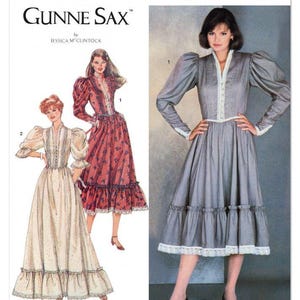 May include: A Simplicity S3215 sewing pattern envelope for a Gunne Sax by Jessica McClintock dress. The cover features illustrations and a photograph of a grey dress with puff sleeves, a V-neckline, lace trim, and a ruffled hemline.