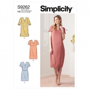 May include: Simplicity sewing pattern S9262 for a dress with a V-neckline and short sleeves. The pattern includes three variations: a yellow floral print, a peach floral print, and a blue patterned design, with sizes ranging from U.S. 6-14.
