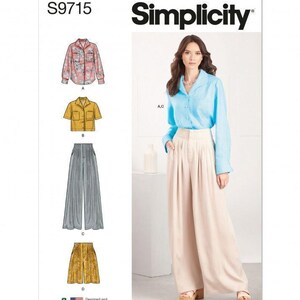 May include: Simplicity sewing pattern S9715 featuring illustrations of four garment variations: a long-sleeve floral shirt, a short-sleeve mustard shirt, grey wide-leg trousers, and mustard patterned culottes, alongside a photo of a light blue shirt.