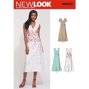 May include: New Look pattern N6600 for a wrap dress. The pattern shows a white dress with a red floral print, a solid tan dress, and a solid light green dress. All versions feature a V-neckline, short sleeves, and a tie waist closure.