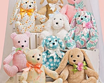May include: A Simplicity 8044 sewing pattern envelope featuring illustrations of various stuffed animals including bears and rabbits. The plush toys are crafted in diverse fabrics such as polka dots, gingham, floral prints, and solid textures, each adorned with decorative ribbons.