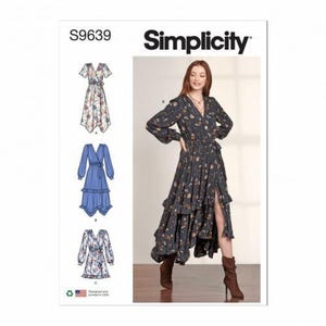 May include: Simplicity sewing pattern S9639 featuring a wrap dress with long sleeves, a V-neckline, and a tiered ruffled skirt. The pattern includes three variations: a floral print short-sleeve dress, a solid blue long-sleeve dress, and a floral print long-sleeve dress.
