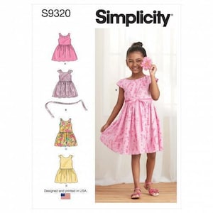 May include: Simplicity pattern S9320 features four dress variations including a pink sleeveless dress, a lace overlay dress, a floral print dress, and a yellow dress. The pattern envelope displays these designs alongside a finished pink dress.
