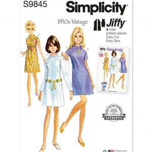May include: A Simplicity S9845 sewing pattern envelope featuring 1950s vintage Jiffy designs. The cover displays illustrations of three dresses: a yellow patterned dress, a white textured dress with a gold belt, and a solid purple dress with a brooch.