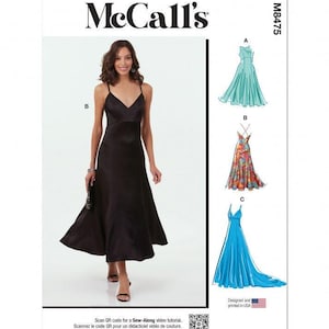 Può includere: Busta per cartamodello McCall's M8475 con un abito midi nero a scollo a V con spalline sottili. La copertina mostra tre varianti di abito: un abito turchese senza maniche, un abito con stampa floreale multicolore e un abito blu lungo.