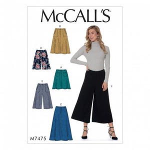 May include: McCall's sewing pattern M7475 for culottes and skirts. The pattern includes five different styles: a mustard yellow skirt, a floral print skirt, a teal green skirt, a grey and white plaid skirt, and a blue denim skirt. The model is wearing a black pair of culottes.