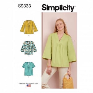 May include: Simplicity sewing pattern S9333 featuring a V-neck top with three variations. The illustrations show a mustard yellow top, a multi-coloured leaf print top, and a teal top. A model wears a light green version with wide sleeves.