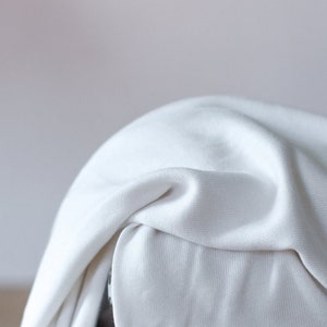 Meet MILK Soft Lima Sweater Knit Stretch Fabric - Bright White Plain Pattern - OEKO-TEX - Width 170cm / 68&quot; - per metre