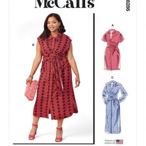 May include: McCall's M8286 sewing pattern envelope featuring a midi-length shirt dress with a geometric print in shades of red, orange, and dark purple. The design includes a collar, button front, and a tie waist. Includes sketches for variations A and C.