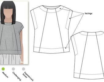 May include: A sewing pattern illustration for a short-sleeved top with a round neckline and panel construction. The image includes a gray-toned visual of the finished garment, a technical line drawing with labels for facings, and a difficulty scale.