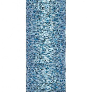 May include: A spool of metallic light blue sewing thread with a shimmering, textured finish. The top label reads Gütermann and the bottom label indicates a length of 50 m - 55 yds/vgs. The thread is wound tightly around a cylindrical plastic core.