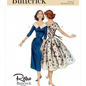 May include: Butterick sewing pattern B6870 featuring two retro dresses from the 1950s. One dress is a solid blue with a white collar, and the other is white with a black floral print. The pattern includes sizes A5 (6-8-10-12-14).