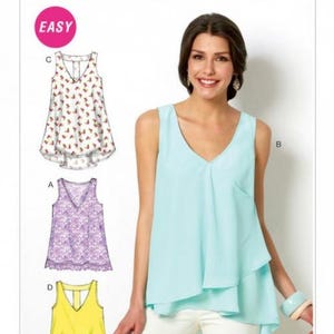 May include: McCall's Easy sewing pattern for a sleeveless top with a V-neck and a layered design. The pattern includes four different variations: a floral print, a lace top, a solid color top, and a tie-front top.