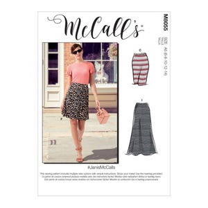 May include: McCall's M8055 sewing pattern envelope featuring a pink short-sleeved top and a leopard print skirt. The pattern includes illustrations for a striped knee-length skirt labelled C and a striped floor-length skirt labelled I, size A5.