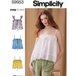 May include: Simplicity sewing pattern S9953 for an easy-to-sew top. The pattern envelope displays three variations of a sleeveless camisole top with thin straps and a ruffled neckline. One version is white eyelet fabric, one is blue, and one is yellow.