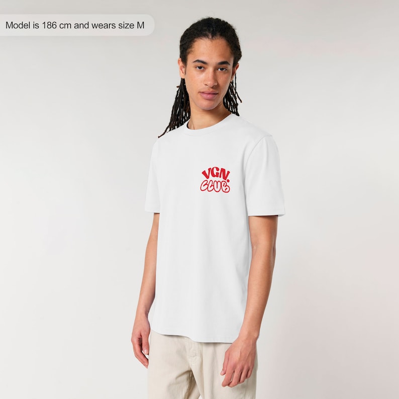 May include: White t-shirt with a red "VGN CLUB" logo in a retro font.