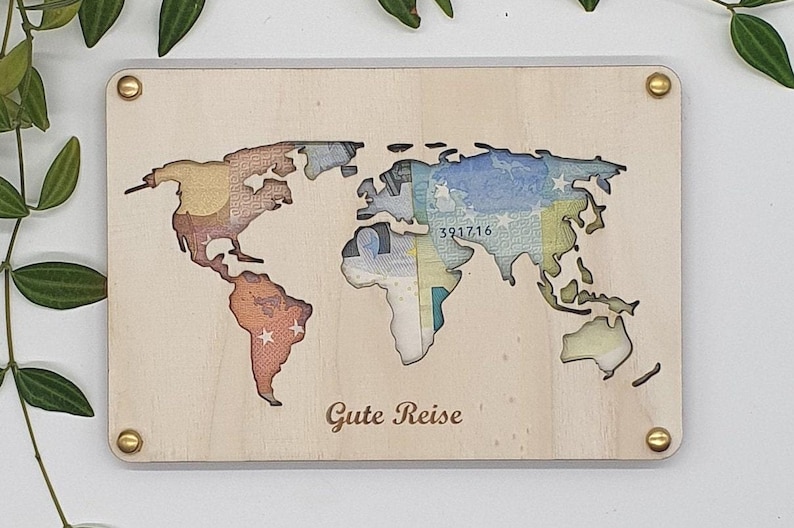 Geldgeschenk Weltkarte mit eingelegtem Geldschein – kreative Geschenkidee