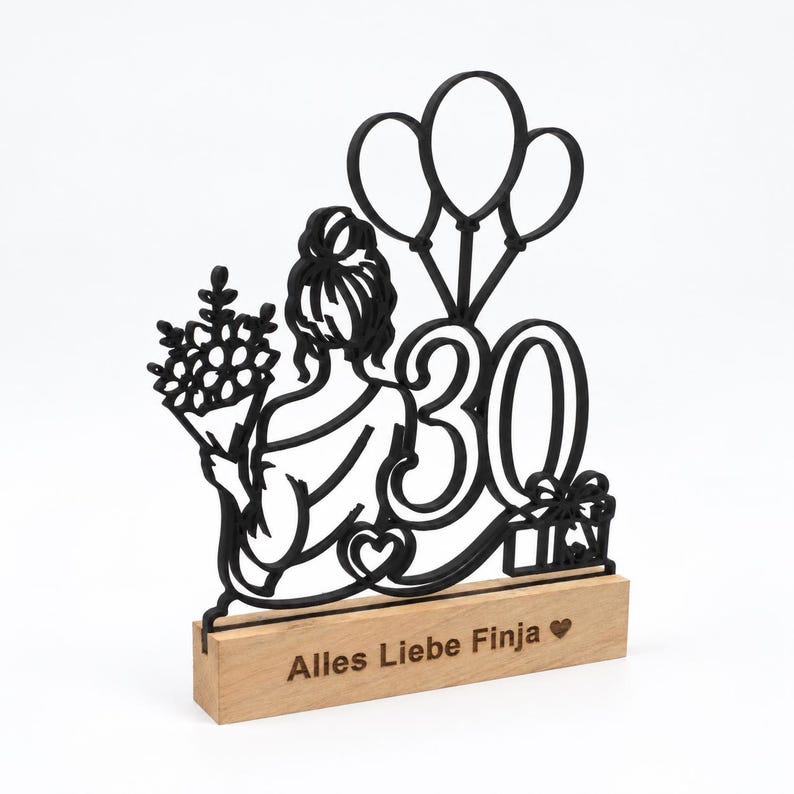 Schwarzer Line-Art-Aufsteller mit Frau, Ballons und Zahl 30 auf Holzsockel, Ansicht von der Seite.