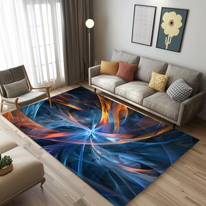May include: A rectangular area rug with an abstract design. The rug features a vibrant pattern of blue, orange, and white swirling lines. The rug is placed on a hardwood floor, and is surrounded by furniture.