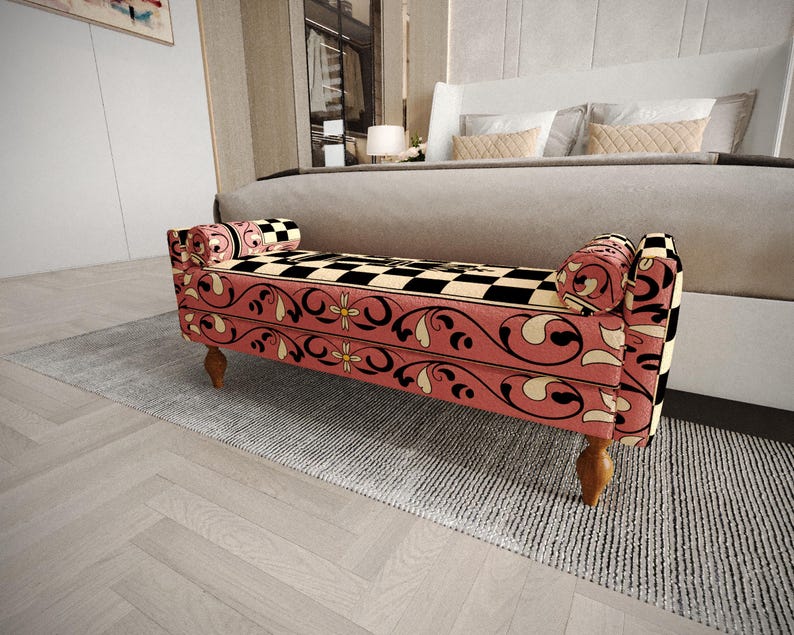 a modern bedroom with a large bed and a decorative bench with a checkered pattern on the seat.