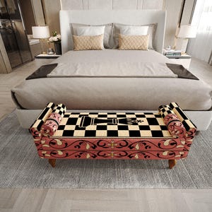 a modern bedroom with a large bed, a checkered bench, and a white headboard. The bed has a gray comforter and a black and white checkered pattern on the bench. The room has a neutral color scheme with gray walls and a gray rug.